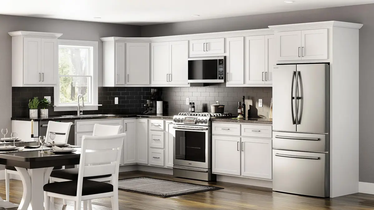 White kitchen next to a dining area