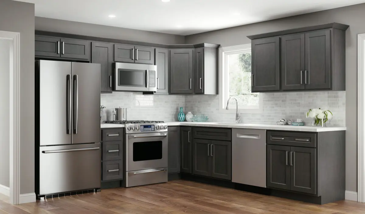 Dark gray L-shaped kitchen with stainless appliances